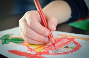 Child hand coloring